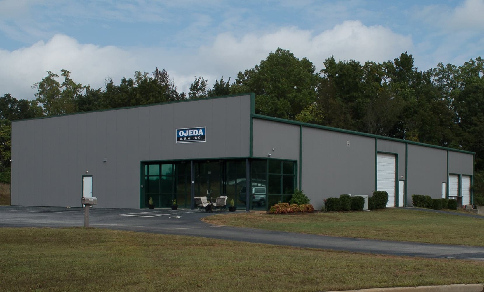 Ojeda USA Inc industrial facility with branded exterior signage and loading docks at 460 Southport Commerce Blvd, Spartanburg, SC
